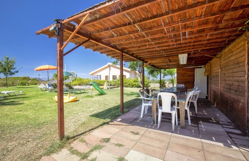 Olmedo Apartment | Apartment in "Casa Vacanze Oleandro" with Wi-Fi, Garden & Terrace