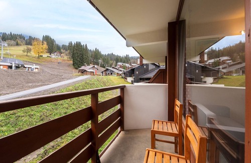 Les Esserts Apartment | Apartment in Morillon with Pool & Mountain Views