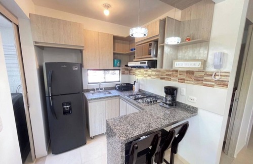 La Tebaida Apartment | Apartment in Tebaida with pool, slide, and BBQ