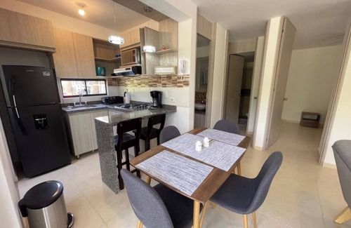 La Tebaida Apartment | Apartment in Tebaida with pool, slide, and BBQ