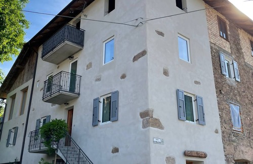 Revo Apartment | Apartment in the mountains, view of the Maddalene chain -Trentino-Alto Adige CIN