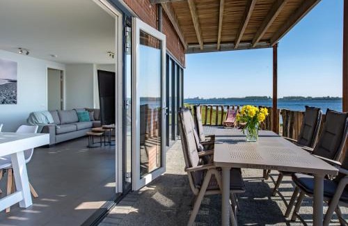 Kamperland Apartment | Apartment in Zeeland with Private Jetty, cleaning included