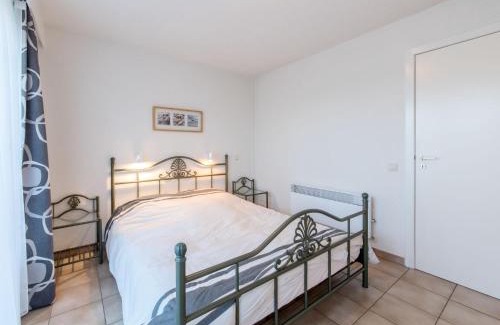 De Haan Apartment | Apartment Isabelle with parking and shared pool by Interhome