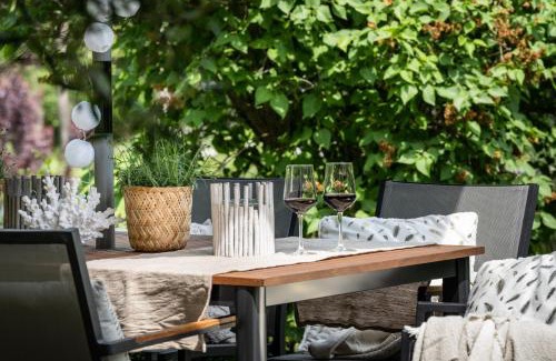 Tentschach Apartment | APARTMENT KLAGENFURT Landhaus Wulfenia - with Free Parking, Sauna, Smart-TV and Air Conditioning