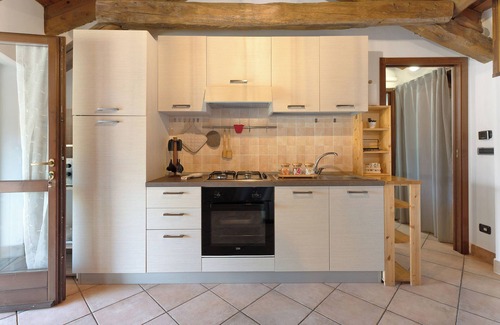 Borgomanero Apartment | Apartment 'L' Antico Fienile' with Private Garden, Wi-Fi and Air Conditioning