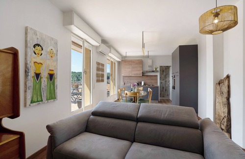 Arona Apartment | Apartment 'La Casa del Riccio' with Lake View, Terrace & Wi-Fi