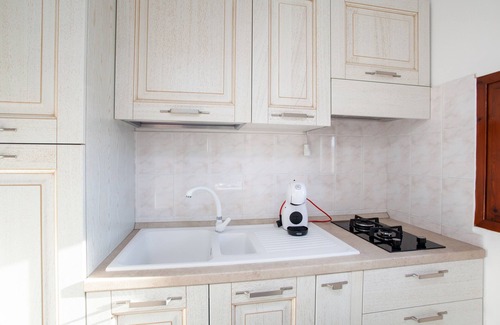 Agrustos Apartment | Apartment "La Finestra sul Mare" with Sea View, Private Terrace & Wi-Fi