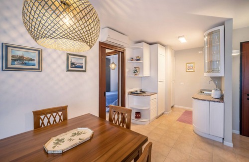 Lignano Sabbiadoro Apartment | Apartment "La Terrazza Sul Faro" with Sea View, Balcony and Wi-Fi