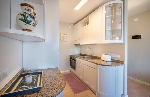 Lignano Sabbiadoro Apartment | Apartment "La Terrazza Sul Faro" with Sea View, Balcony and Wi-Fi