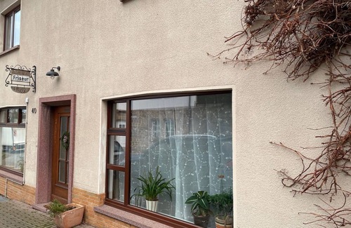 Fritzlar Apartment | Apartment Lila Zimmer - Ferienwohnungen Alter Frisörsalon