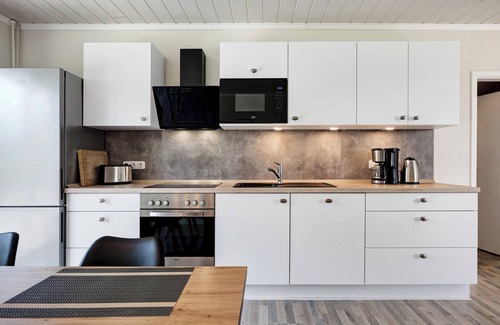 Schleswig-Holstein North Sea Coast Apartment | Apartment 'Links' with Private Terrace and Private Garden