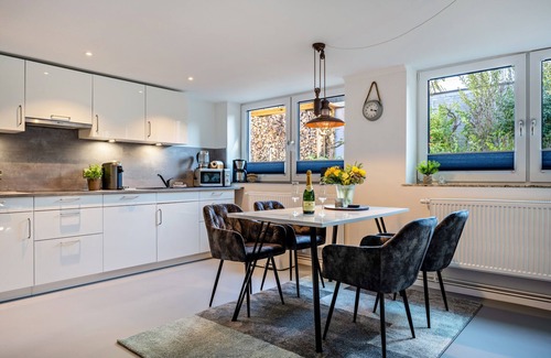 Brodten Apartment | Apartment 'Meerlust' with Private Terrace, Private Garden and Wi-Fi