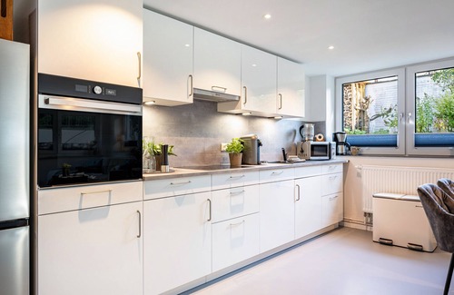 Brodten Apartment | Apartment 'Meerlust' with Private Terrace, Private Garden and Wi-Fi