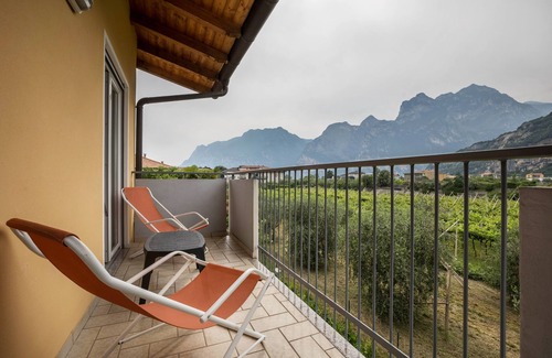 Torbole sul Garda Apartment | Apartment 'N5 Appartamento Viola' with Mountain View, Private Terrace and Shared Garden