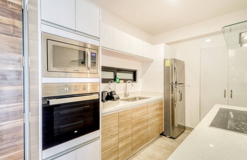 Centro Apartment | Apartment near the beach with strong WiFi, AC, 2 rooftop pools & spa