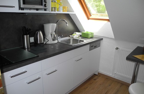 Bad Sachsa Apartment | Apartment near the forest with a large garden with playground and fire pit