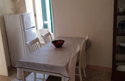 San Donato di Lecce Apartment | Apartment 'Palazzo Costantini - Gerbera' with Shared Terrace, Wi-Fi and Air Conditioning