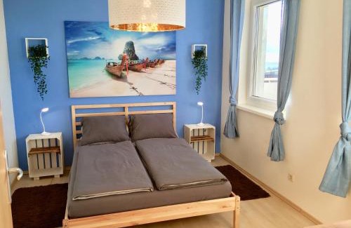 Oberschuetzen Apartment | Apartment Panoramablick mit Infrarotkabine auf der großen Terrasse und traumhaften Ausblick