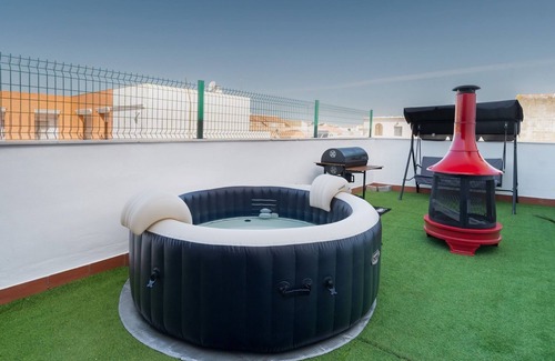 Pilas Apartment | Apartment 'Pilas' with Shared Pool, Wi-Fi and Air Conditioning