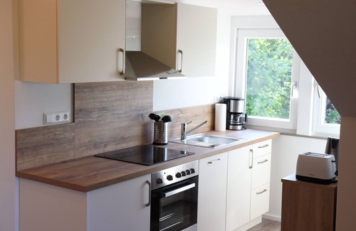 Lindau Apartment | Apartment 'Red' with Shared Garden, Balcony and Wi-Fi