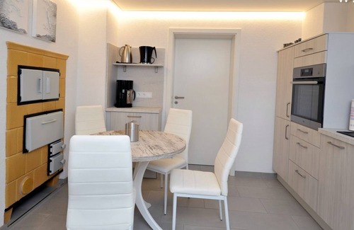 Babow Apartment | Apartment Rita 2, bedroom, living room, kitchen, shower/WC, outdoor seating area - Ferienwohnungen Rita