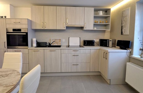 Babow Apartment | Apartment Rita 2, bedroom, living room, kitchen, shower/WC, outdoor seating area - Ferienwohnungen Rita