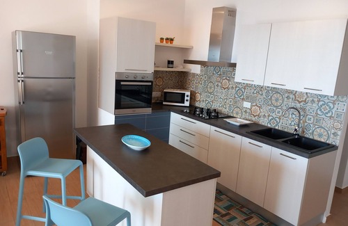 Cala Gonone Apartment | APARTMENT SEA VIEW AND MOUNTAIN Parking- A/C-WIFI-CIN IT 091017C2000P7622