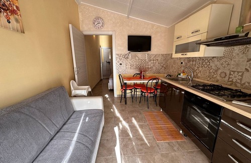 Agnone Bagni Apartment | Apartment 'Serena A Due Passi Dal Mare' with Shared Garden, Wi-Fi and Air Conditioning