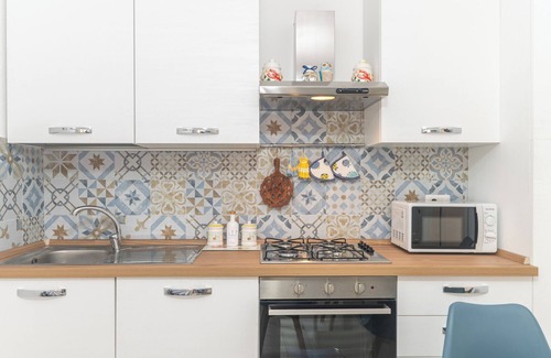 Porto Ottiolu Apartment | Apartment 'Soffio Di Mare' with Private Terrace, Private Garden and Air Conditioning