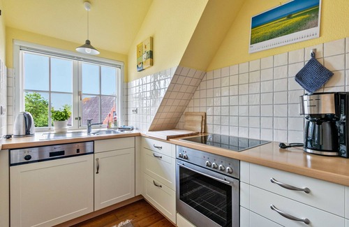Norddeich Apartment | Apartment 'Sonnenzimmer' with Shared Garden and Wi-Fi