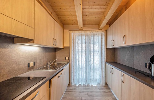 Predazzo Apartment | Apartment “Vacanze Arcobaleno - Giallo” with Mountain View, Sauna & Whirlpool