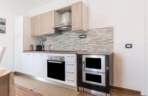 Ville d'Anaunia Apartment | Apartment "Villa Vacanze Pink Lady" with Mountain View, Private Terrace & Shared Garden