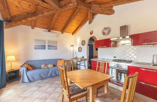 Tiriddo Apartment | Apartment 'Vista Mare Tiriddò' with Sea View, Shared Pool and Air Conditioning