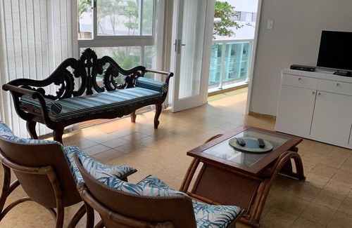 Pitangueiras Apartment | Apartment with balcony and sea view