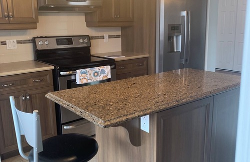 Les Maskoutains Regional County Municipality Apartment | Apartment with Hot Tub and Backyard. Free Parking.