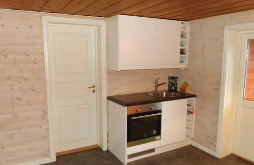 Etne Apartment | Apartment with charm, beautifully located overlooking the lake Stordalsvatnet and mighty mountains.