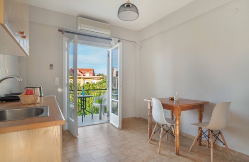 Poros Apartment | Apartment ' with Shared Garden, Wi-Fi and Air Conditioning