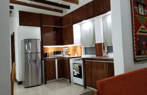 Orange Walk House | Apartment with King bed in the center, sugar city!
