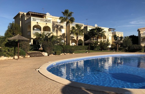 Cala Mandia Apartment | Apartment with large pool and garden in a well-kept complex, ideal for children