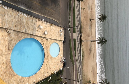 Ipiranga Apartment | Apartment with pool facing the sea