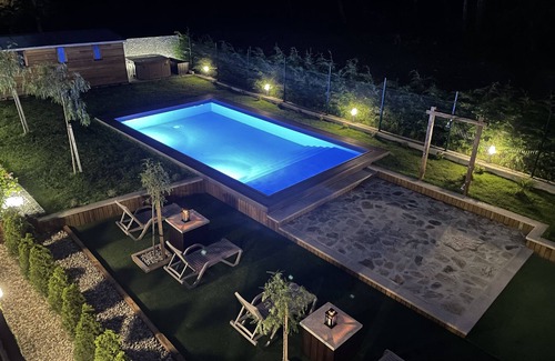 Outes Apartment | Apartment with pool steps from the beach