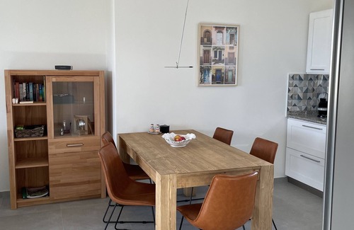 San Lorenzo Apartment | Apartment with sea view, terrace, pool and garden for sole use