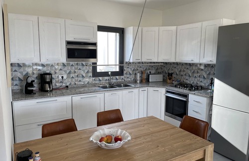 San Lorenzo Apartment | Apartment with sea view, terrace, pool and garden for sole use