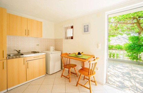 Metajna Apartment | apartment with seaview, bedroom and terrace with seating