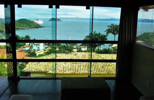 Joao Fernandes Apartment | Apartment with sunset view of the sea in condominium with swimming pool 70m from the best beach in buzios