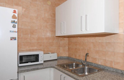 Comarruga Apartment | Apartment with terrace and communal pool