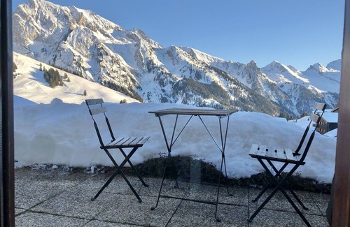 Manigod Apartment | Apartment with terrace, panoramic view and skis at your feet