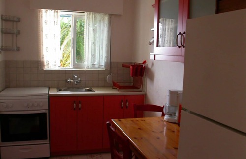 Trifylia Apartment | Apartments for 4 -5 people/romantic palm garden - right on the sea