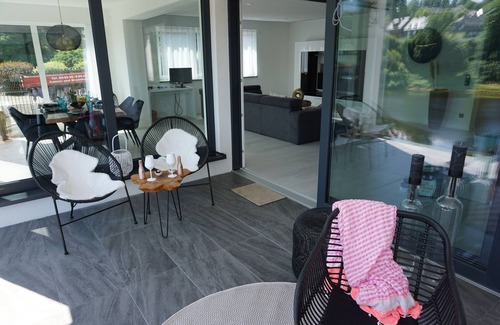 Saaldorf Condo | Apartments- Saaldorf WG 6 with balcony and view of the reservoir