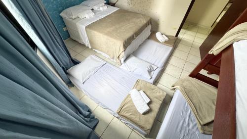 Vila Assuncao Apartment | Ape aconchegante a 50m da Praia Tupi Wi-Fi, Smart TV e enxoval completo